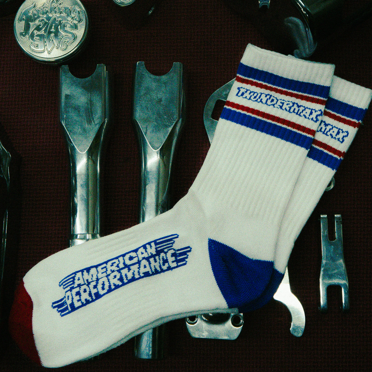 White ThunderMax American Traditional socks showing striped cuffs and branded lettering